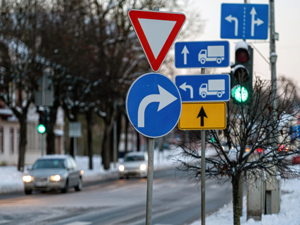 OPTSIGNS | Traffic Sign Frames vs. Brackets: What’s the Difference and When to Use Each?