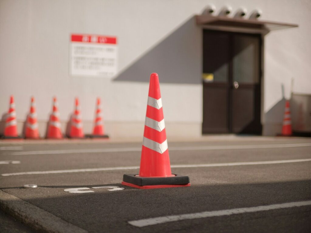 OPTSIGNS | Custom Traffic Cones: Transform Entryway Landscaping and Streamline Traffic Flow