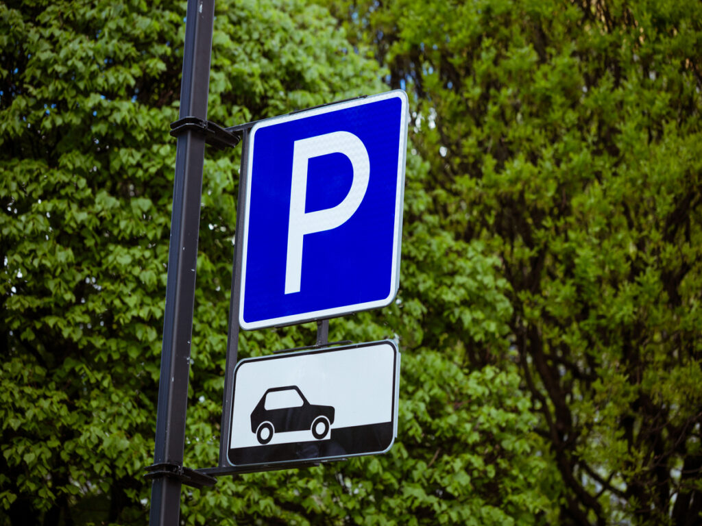 OPTSIGNS | Parking Lot Road Sign Frames: Impact Resistance & Maintenance Strategies