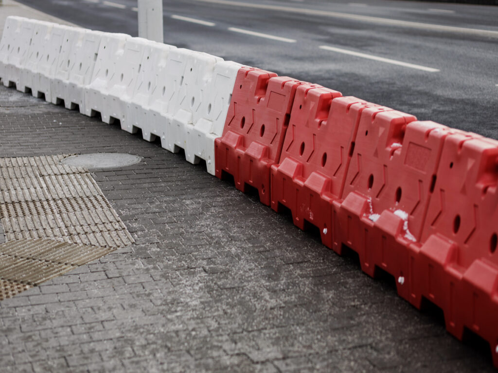OPTSIGNS | What Are Jersey Barriers? A Key Component of Road Safety Barriers OPTSIGNS | What Are Jersey Barriers? A Key Component of Road Safety Barriers