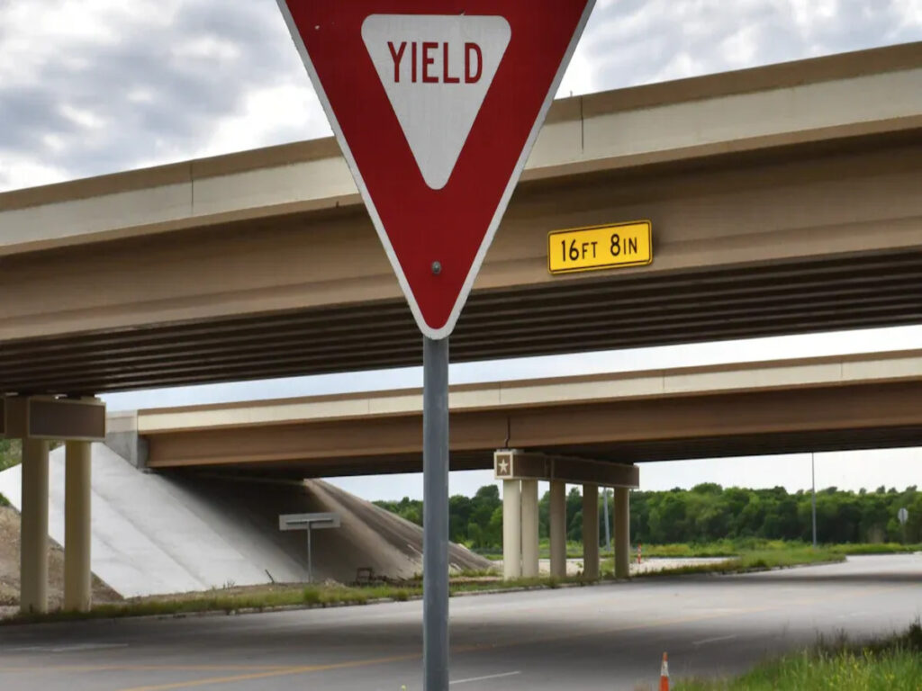 SEGNI OTTICI | Give Way vs. Yield: Understanding the Differences in Road Sign Language Between Australia and the UK OPTSIGNS | Give Way vs. Yield: Understanding the Differences in Road Sign Language Between Australia and the UK