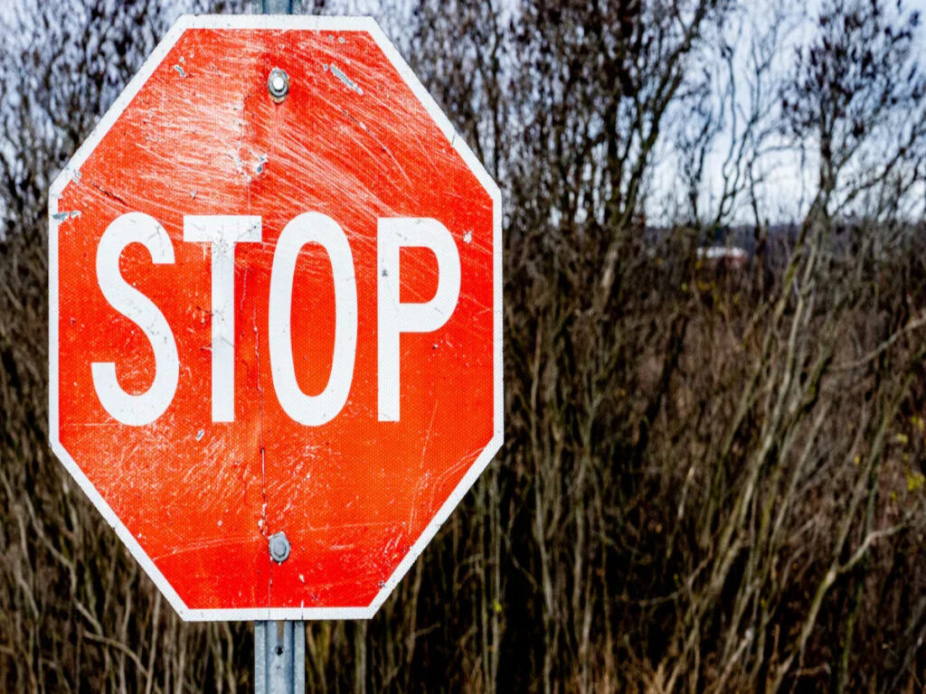 OPTSIGNS | The Benefits of Laminate for Enhancing Traffic Sign Durability and Performance