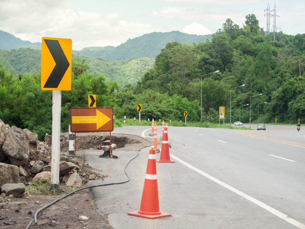 OPTSIGNS | How Traffic Cones Ensure Safety in Seal Coat Construction Projects OPTSIGNS | How Traffic Cones Ensure Safety in Seal Coat Construction Projects
