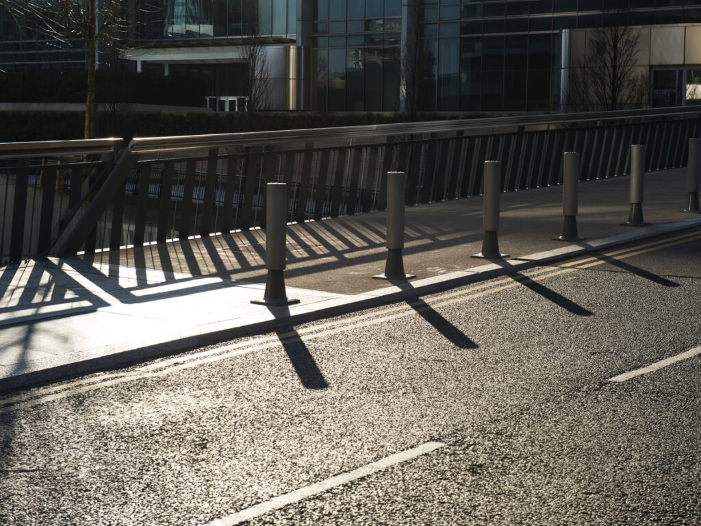 OPTSIGNS | Safety Bollard Material Cost Breakdown: Steel vs Stainless Steel vs Iron