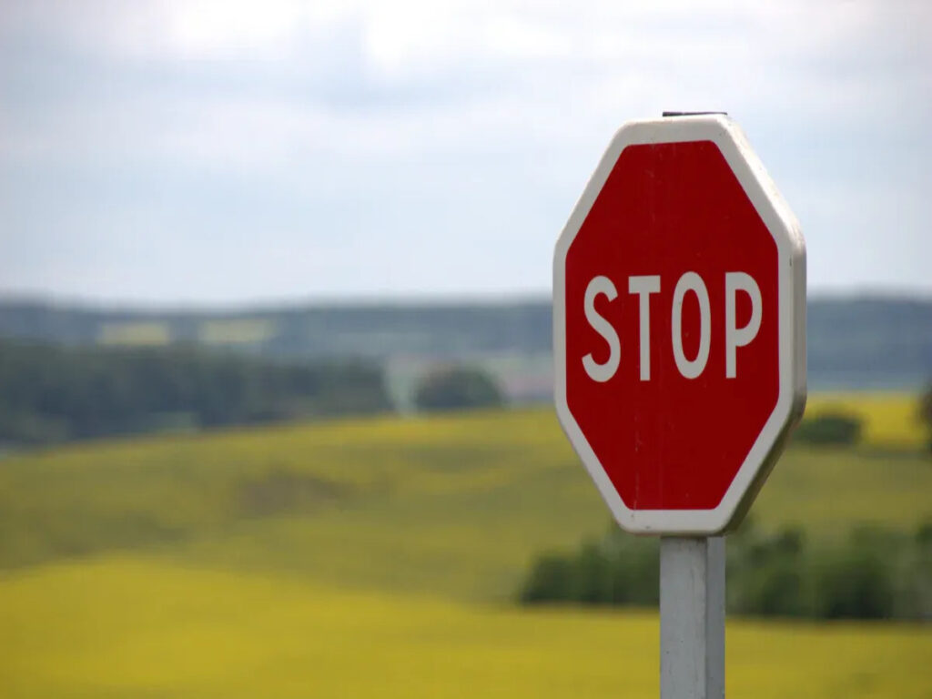 Why Traffic STOP Signs Are Rare In UK British Road Sign Strategy