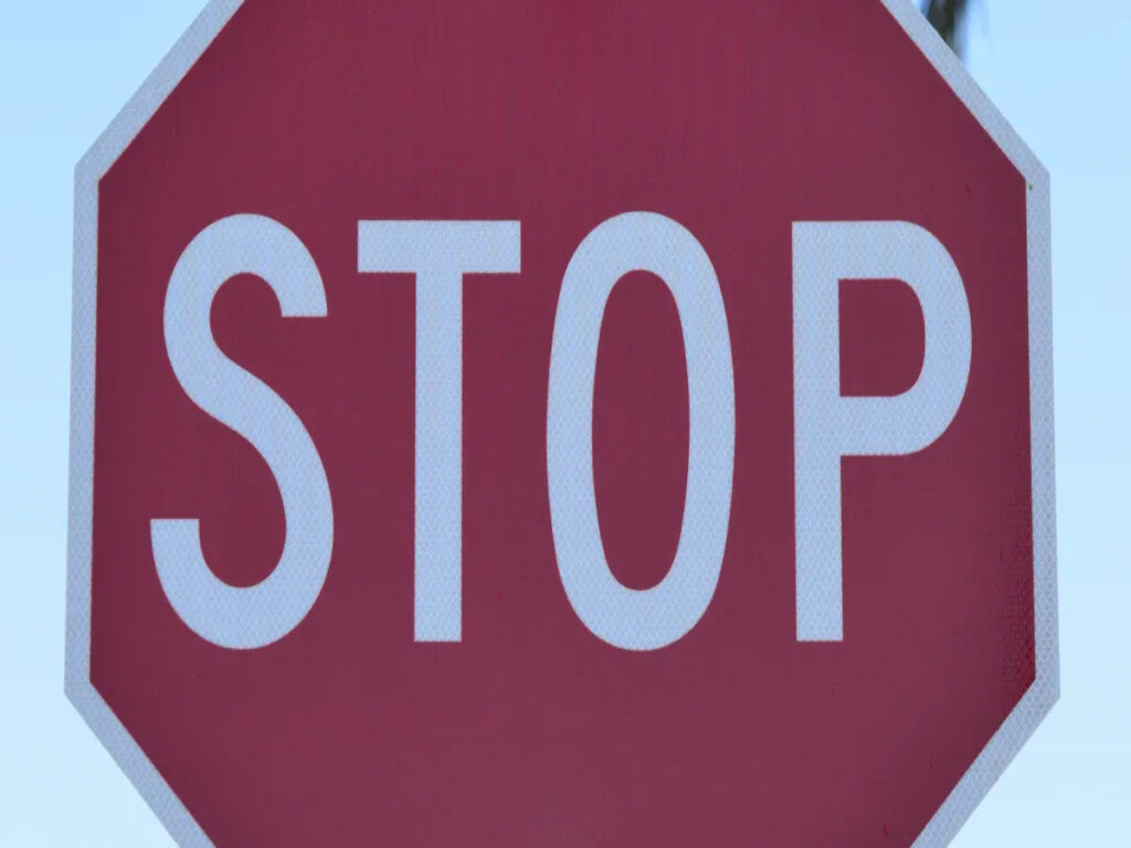 OPTSIGNS | Are STOP Signs Still Relevant in a World of Smart Traffic Systems?