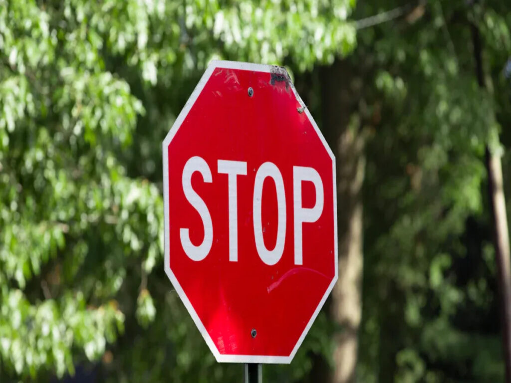 OPTSIGNS | Black Dot Stop Signs and Color Blindness: A Design for Inclusive Road Safety