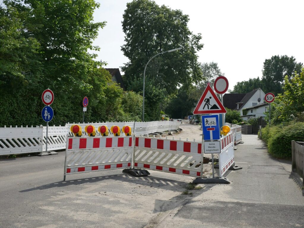 OPTSIGNS | Barrier vs. Barricade: Understanding the Key Differences for Road Safety and Construction Projects