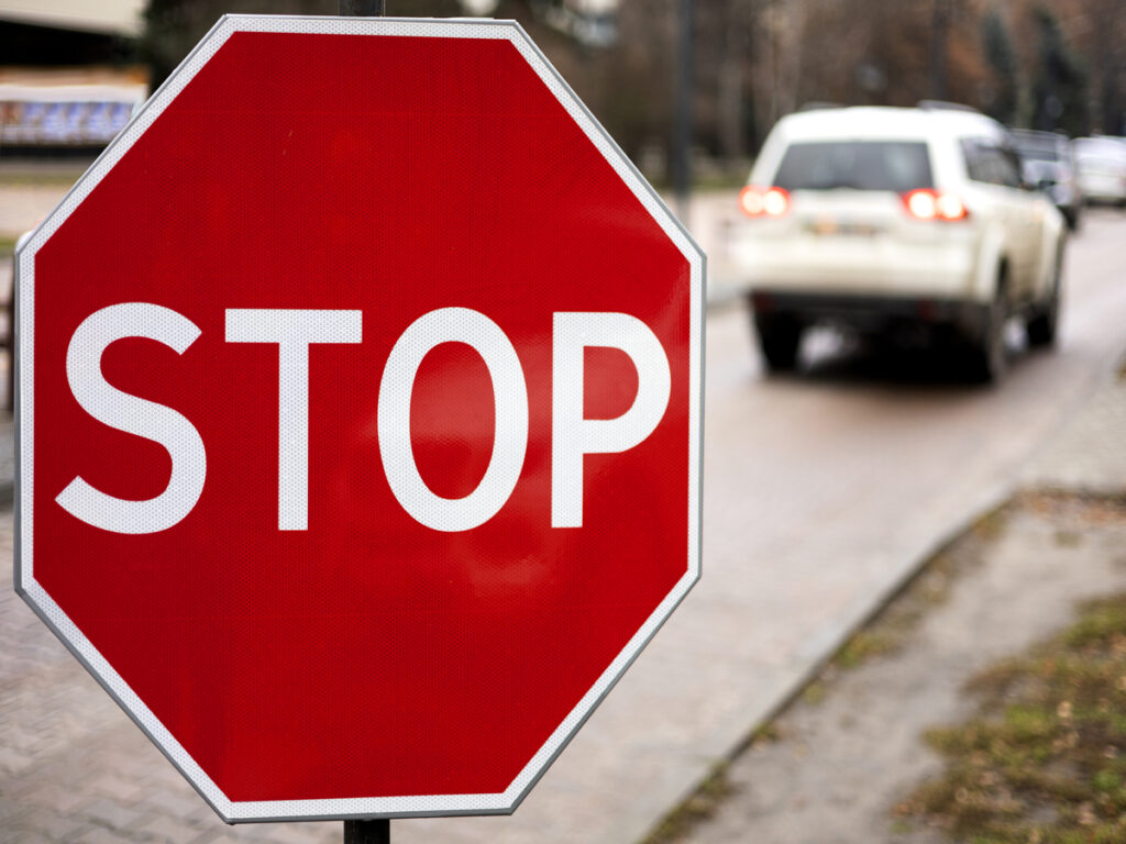 OPTSIGNS | STOP Signs vs Speed Humps: Which Is Better for Traffic Calming?