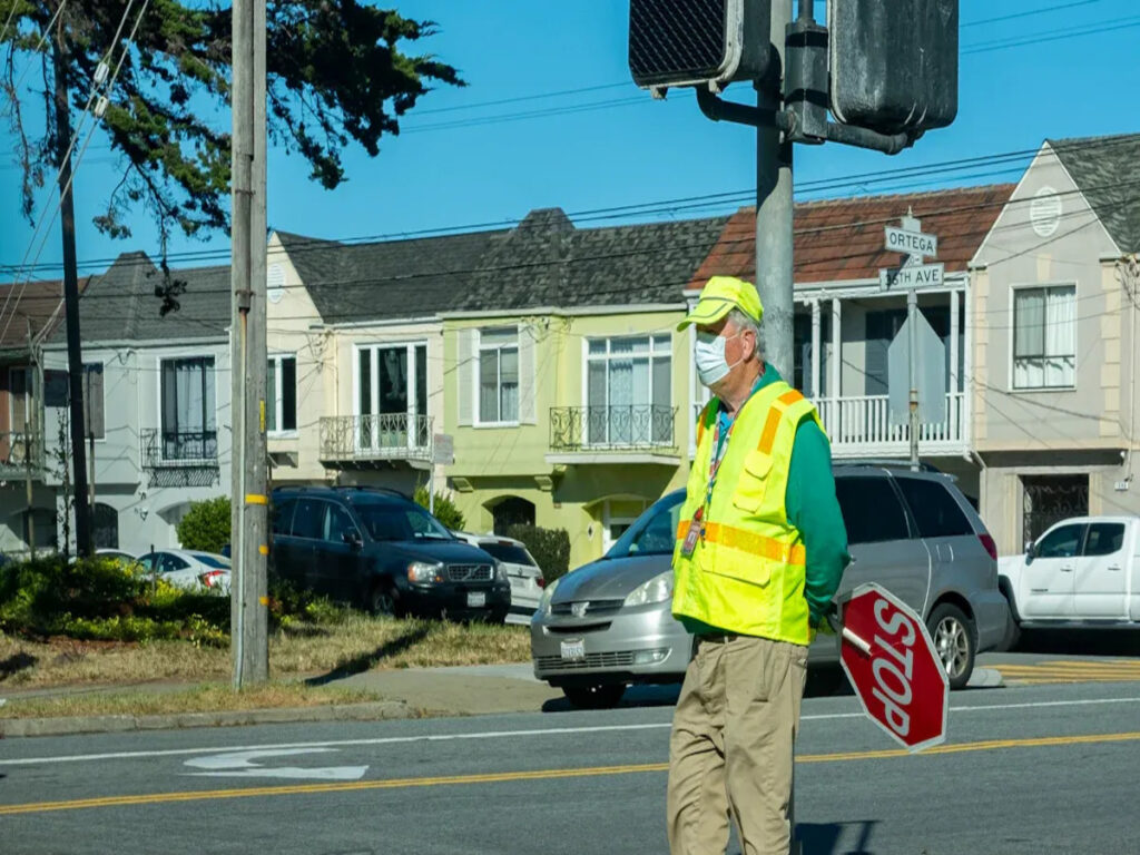 OPTSIGNS | When to Stop for Crossing Guards Using Hand Held Stop Signs