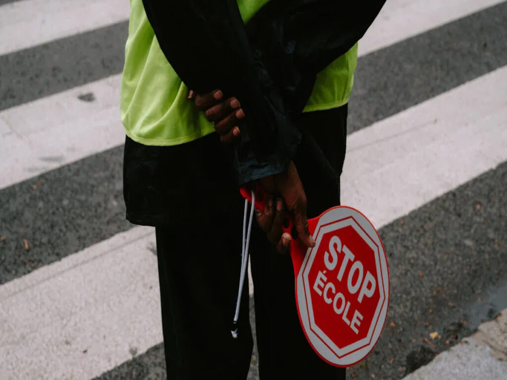 OPTSIGNS | Comparing Hand Held Stop Signs and Traditional Road Signs in Modern Construction