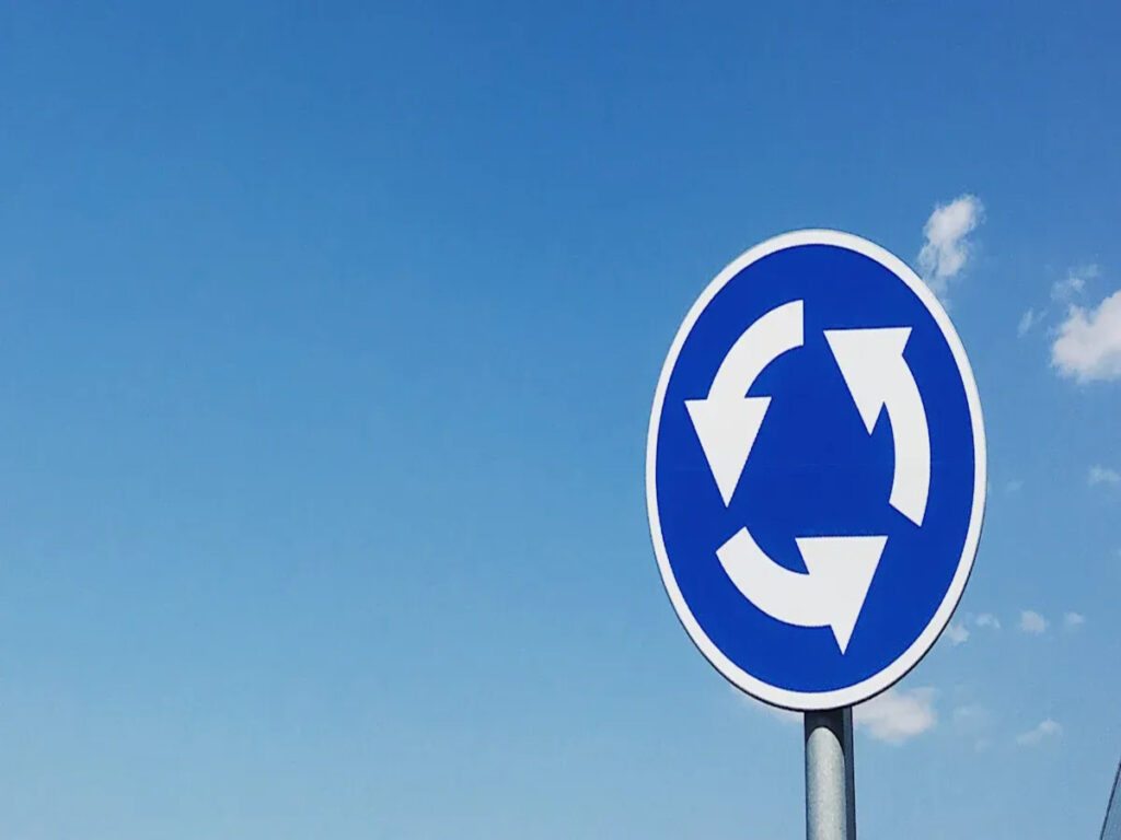 OPTSIGNS | Boosting Safety and Efficiency with Strategic Roundabout Traffic Sign Deployment