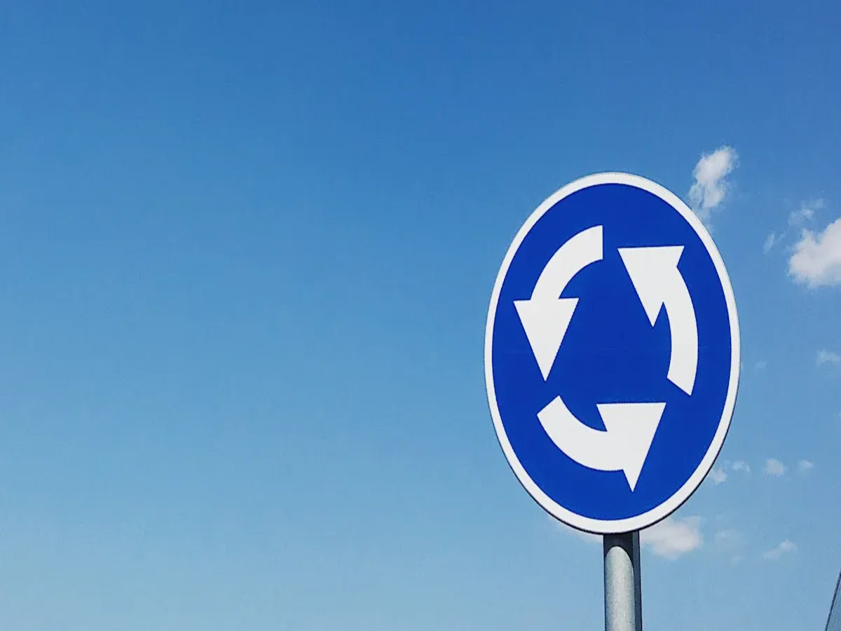 OPTSIGNS | Boosting Safety and Efficiency with Strategic Roundabout Traffic Sign Deployment