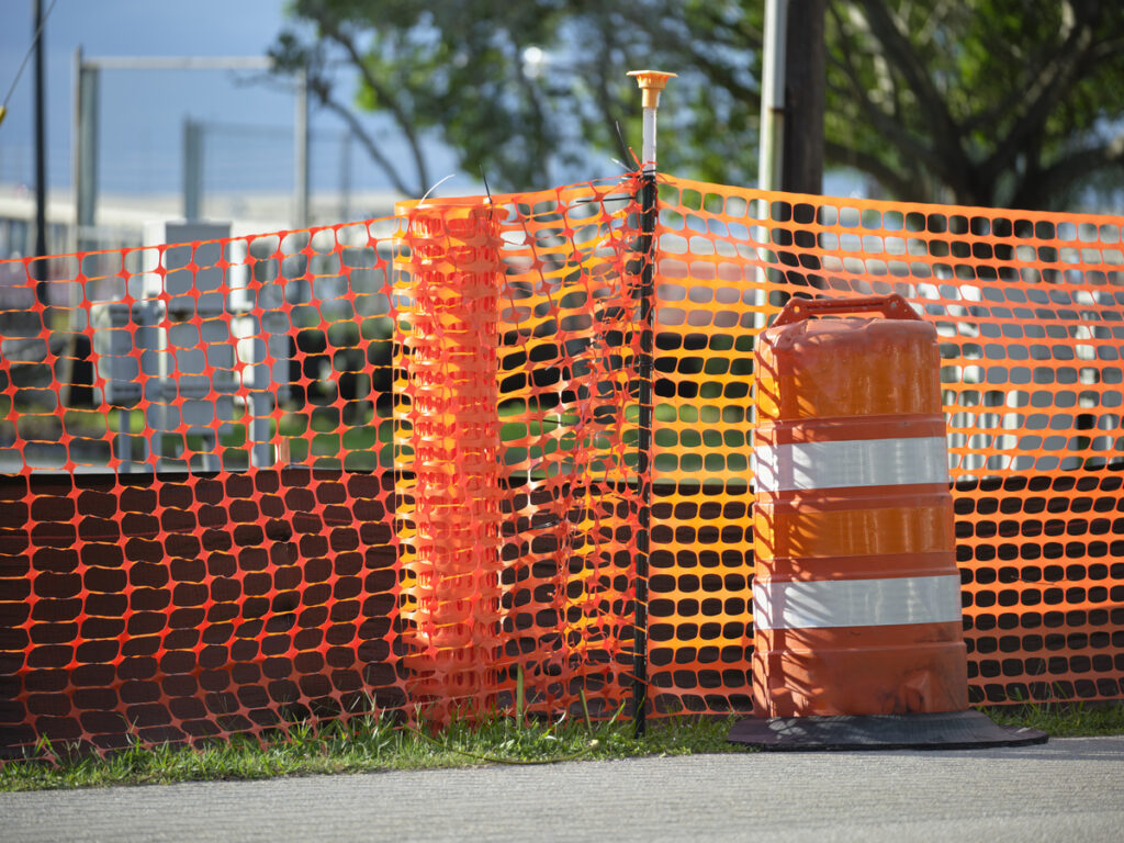 OPTSIGNS | How to Secure an Orange Construction Fence: Tips for Safe and Effective Installation