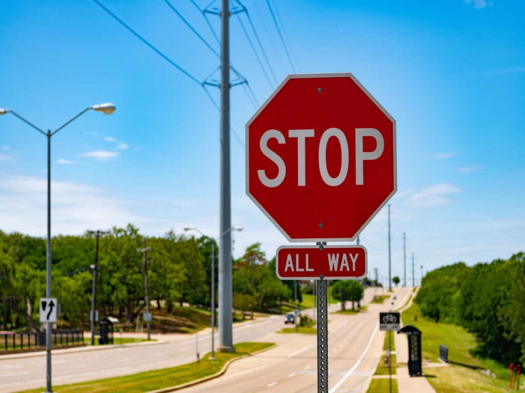 OPTSIGNS | Stop Signs for Sale: A Complete Guide to MUTCD Compliant Stop Sign Standards, Placement, and Warrant Analysis