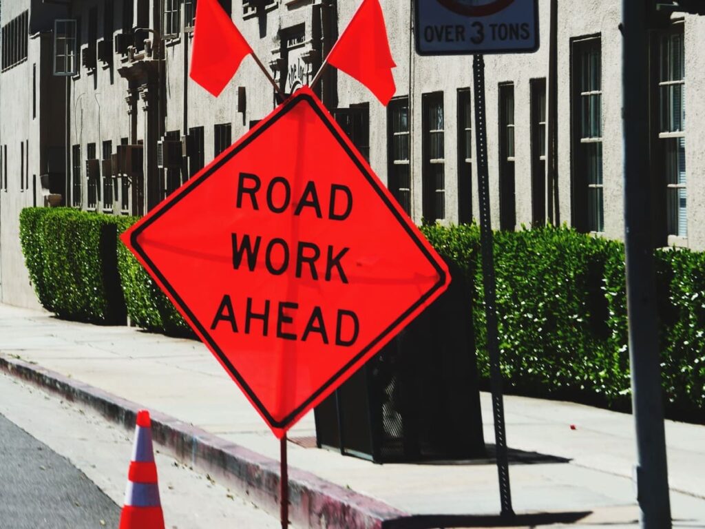 OPTSIGNS | Roll-Up vs. Rigid Aluminum Construction Ahead Signs: Which is Right for Your Construction Project?