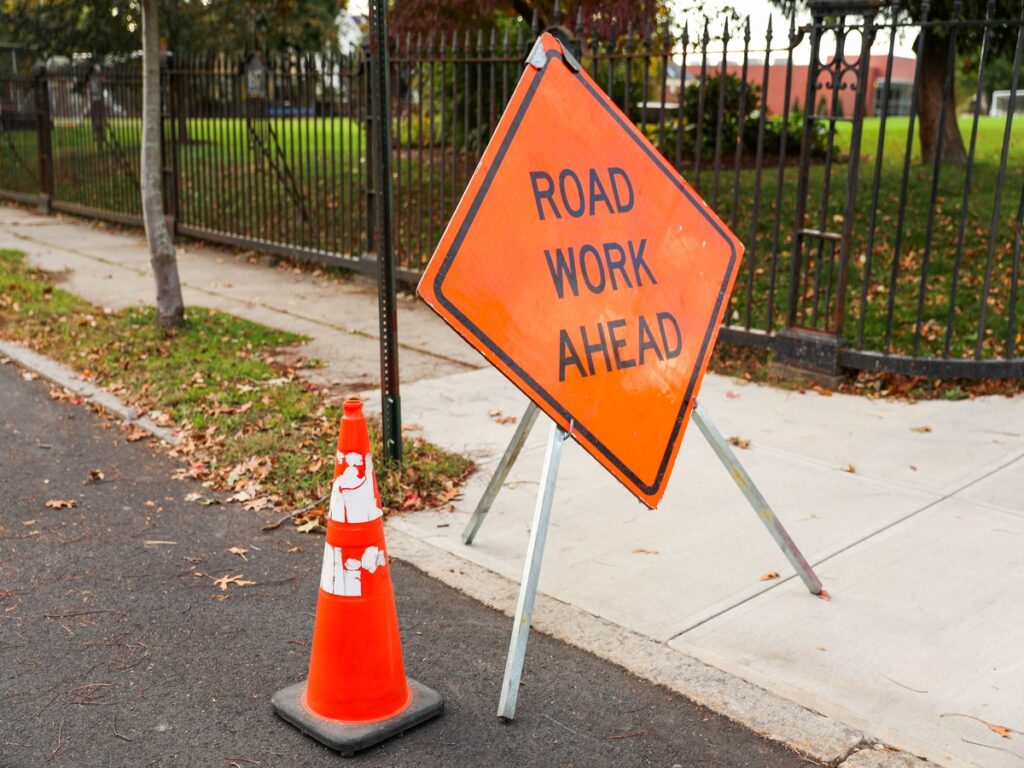 OPTSIGNS | Roll-Up vs. Rigid Aluminum Construction Ahead Signs: Which is Right for Your Construction Project?