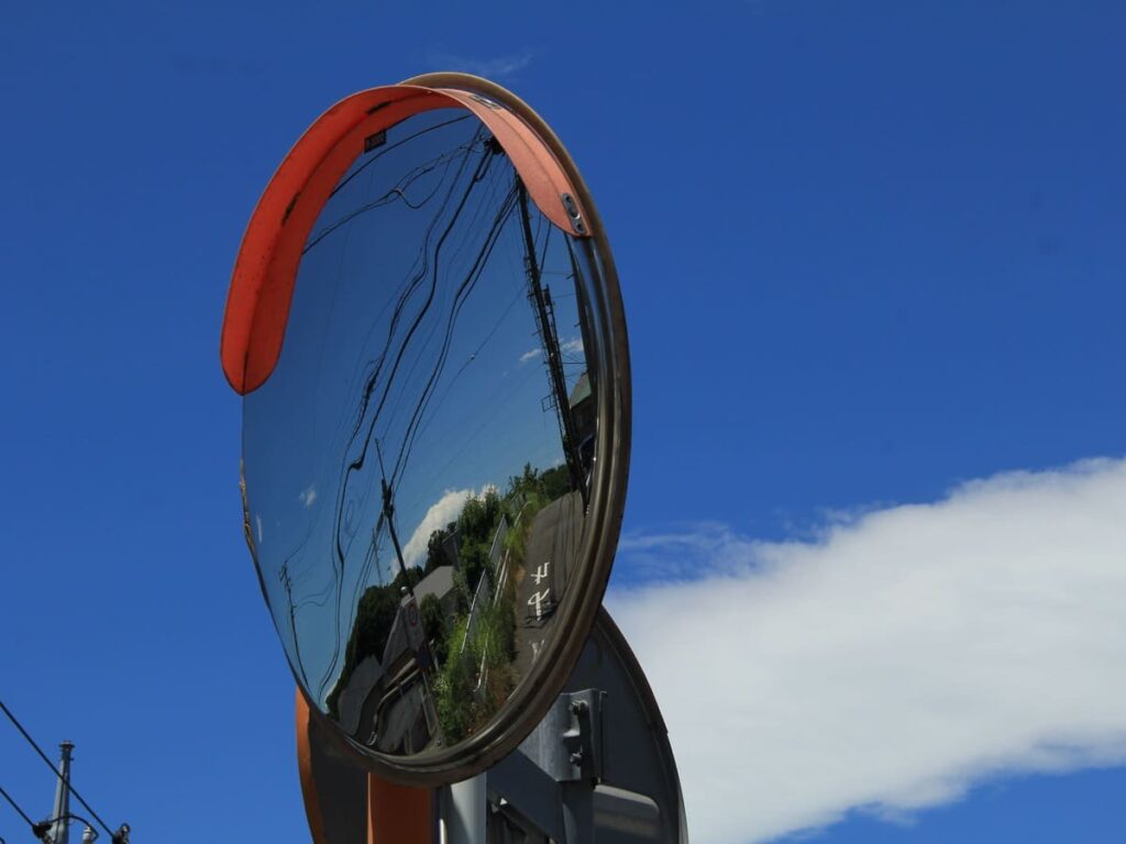 OPTSIGNS | How Convex Safety Mirrors and Reflective Signs Work Together for Safer Intersections