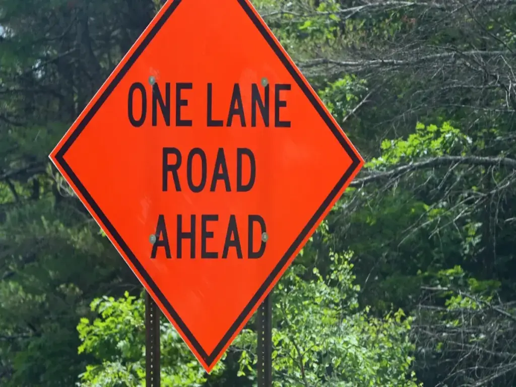 OPTSIGNS | How ASTM B206 Defines the Quality of Aluminum Sign Blanks for MUTCD Signs