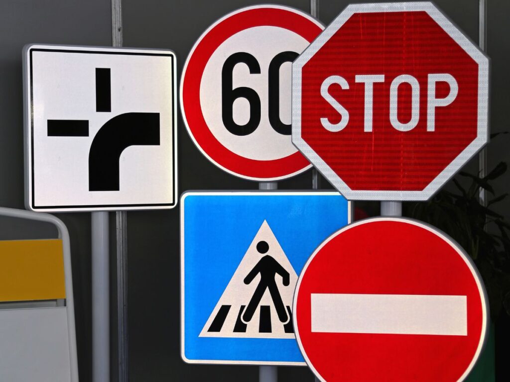 OPTSIGNS | Designing Bilingual Safety Signs: Graphics vs Text in Multilingual Environments